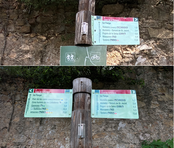Foto: Tourdera. Reposició de senyalització a La Farga d'Hostalric.